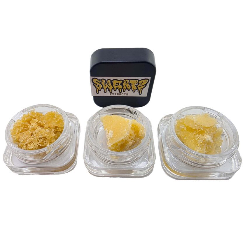 Assorted SWEATZ live resin crumble strains displayed in clear jars with branded packaging